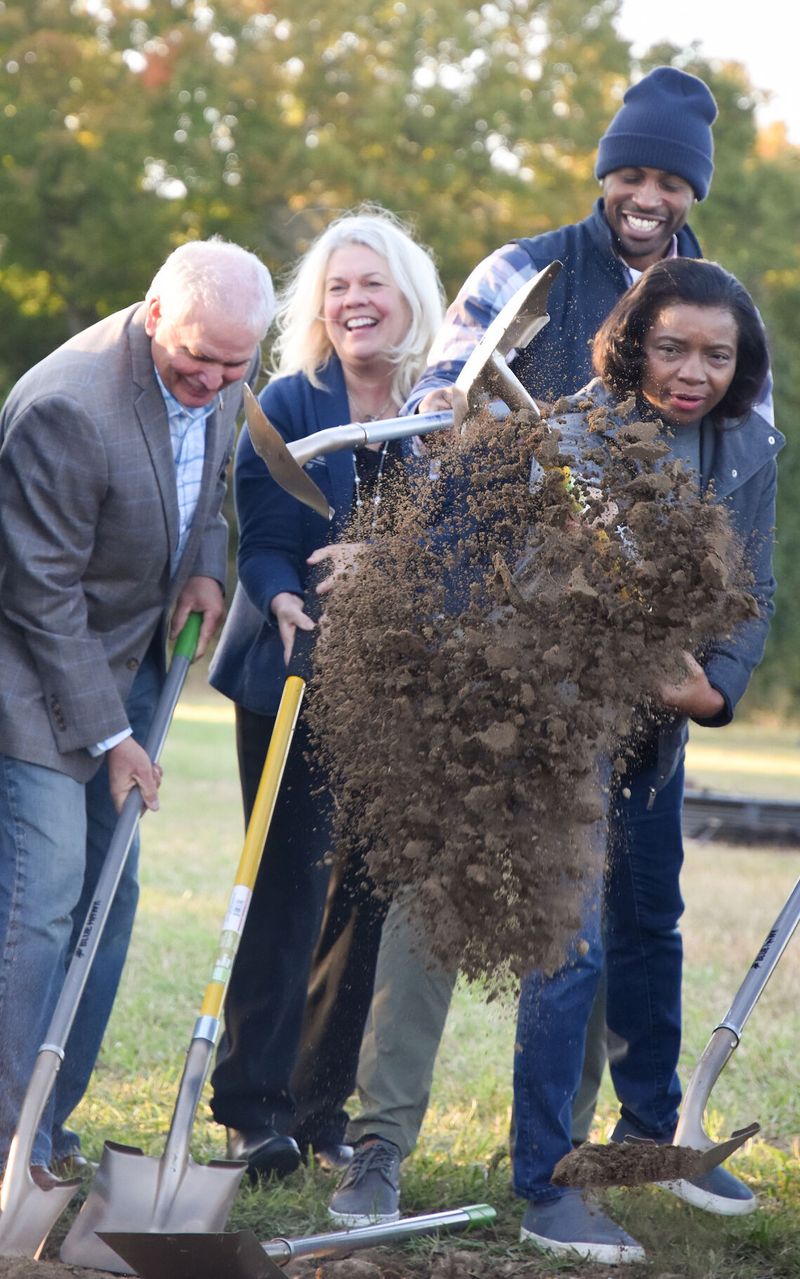 Della Streaty-Wilhoit upturns dirt with her shovel